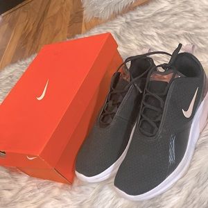 Used Nike Womens Revolution black tennis shoes size 10